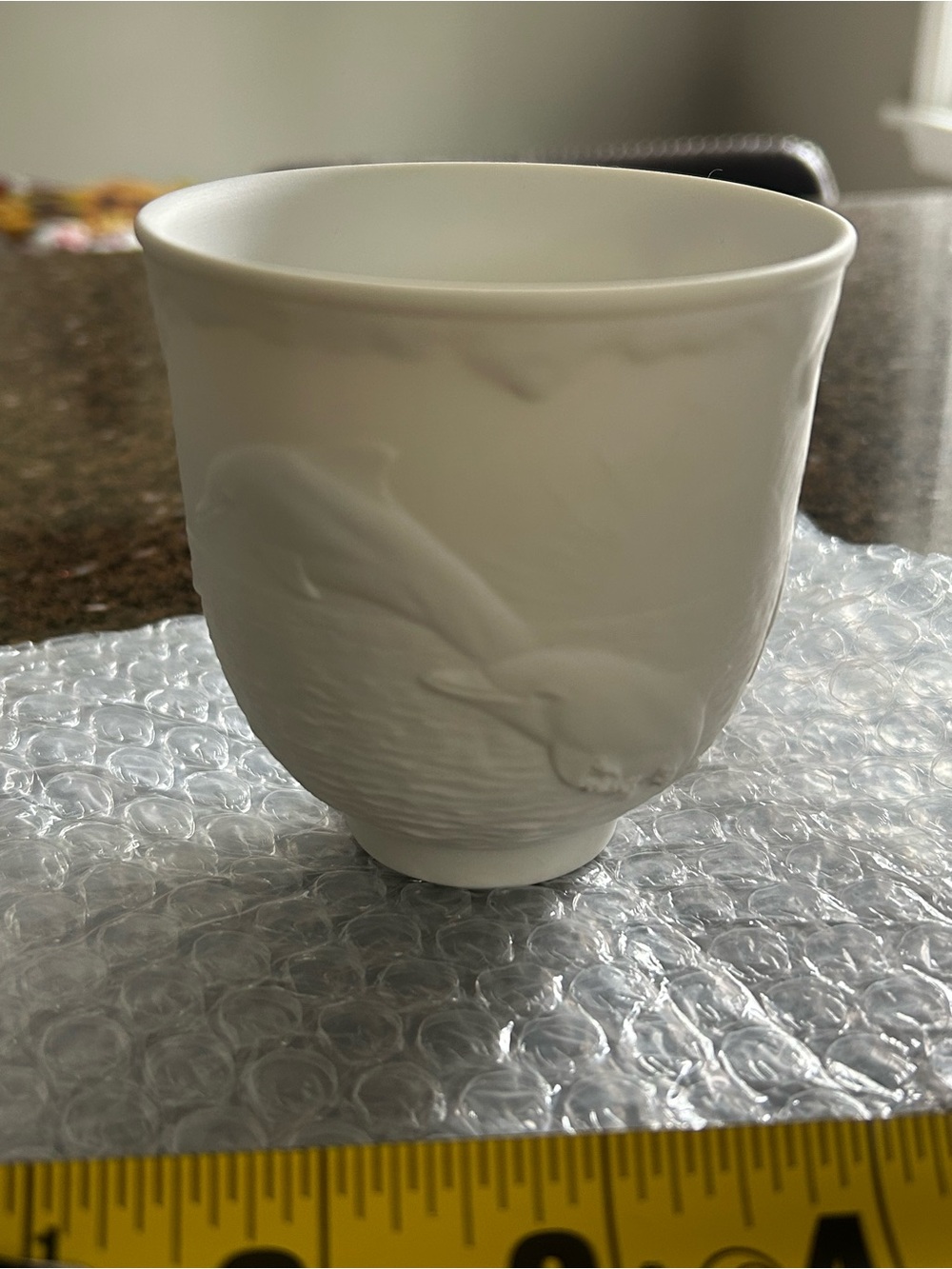 Lladro Matte White Porcelain Cup with Embossed dolphins
